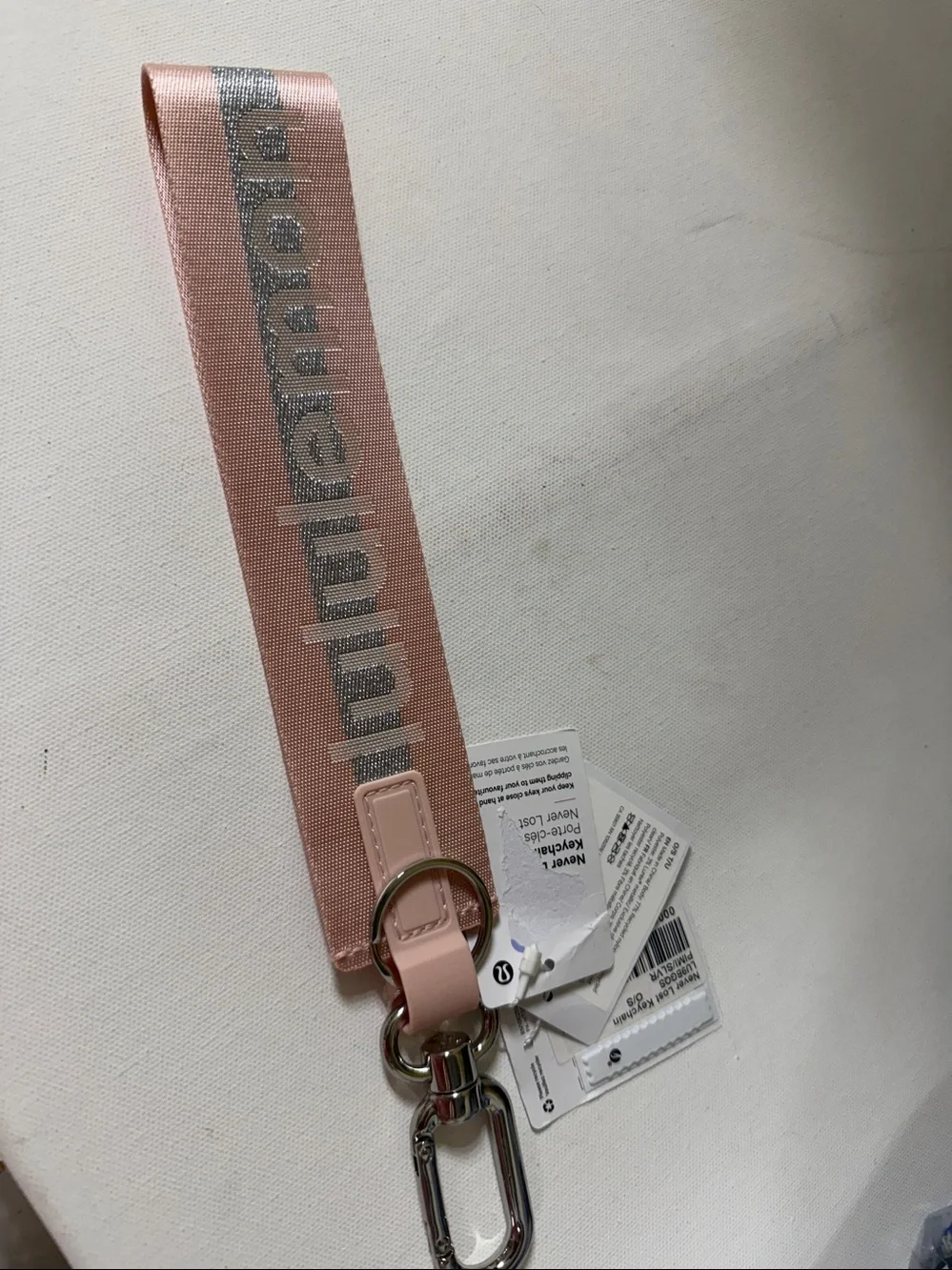 Lululemon Athletica Never lost Keychain . NEW with tags